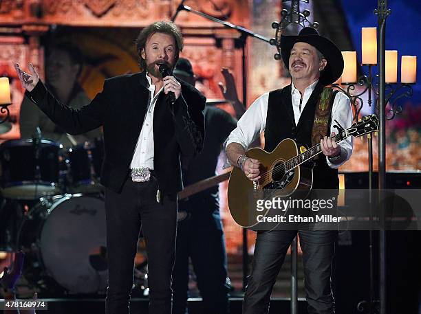 Honorees Ronnie Dunn and Kix Brooks of Brooks & Dunn perform during the 50th Academy of Country Music Awards at AT&T Stadium on April 19, 2015 in...