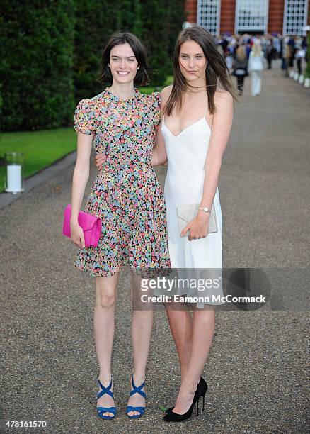 Sam Rollinson and Charlotte Wiggins attend the Vogue and Ralph Lauren Wimbledon party at The Orangery on June 22, 2015 in London, England.
