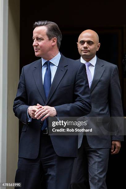 British Prime Minister David Cameron and Sajid Javid, Secretary of State for Business, Innovation and Skills, leave 10 Downing Street on June 23,...