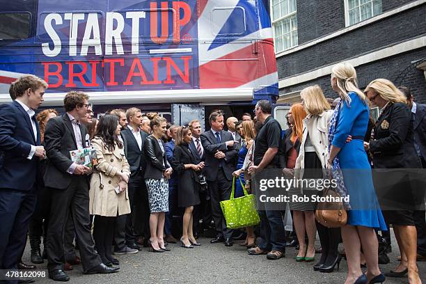British Prime Minister David Cameron and Sajid Javid , Secretary of State for Business, Innovation and Skills, meet with mentors and supporters from...