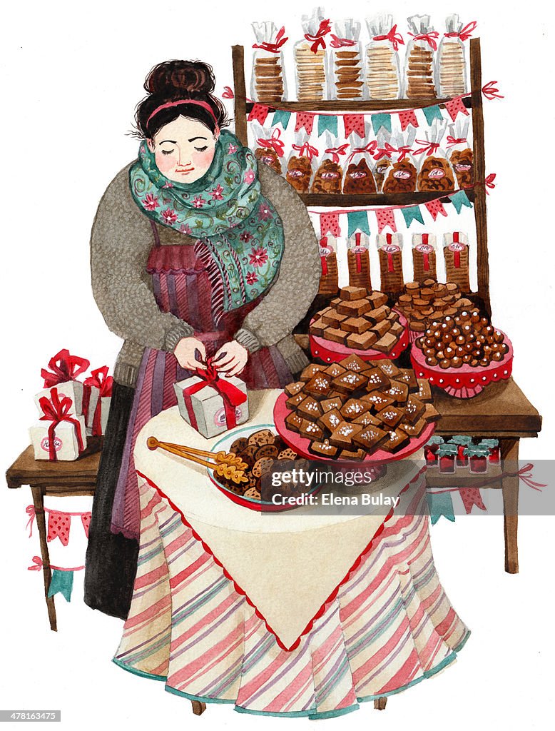 A woman selling baked goods