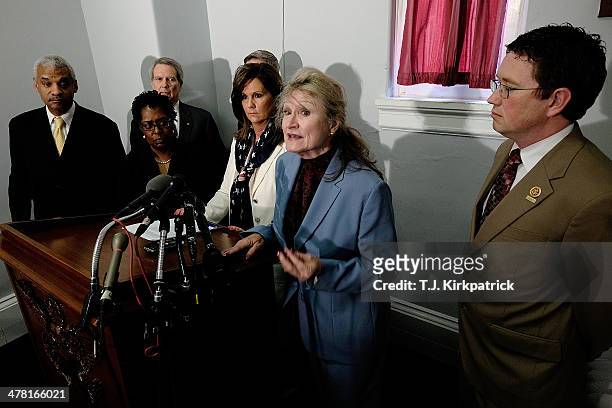 Alice Hoagland, at center, speaks during a press conference with Emanuel Lipscomb, from left, a survivor of the World Trade Center terrorist attack,...