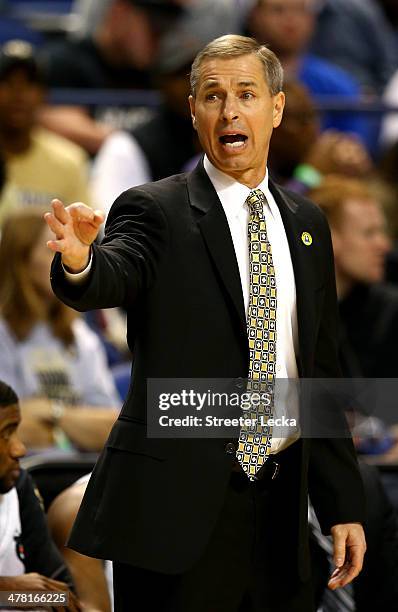 Head coach Jeff Bzdelik of Wake Forest Demon Deacons calls a play during the first round of the 2014 Men's ACC Basketball Tournament at Greensboro...