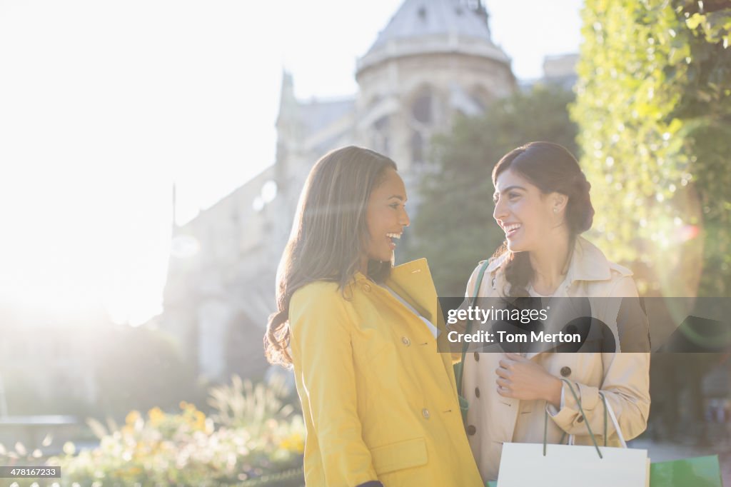 Women talking in urban park