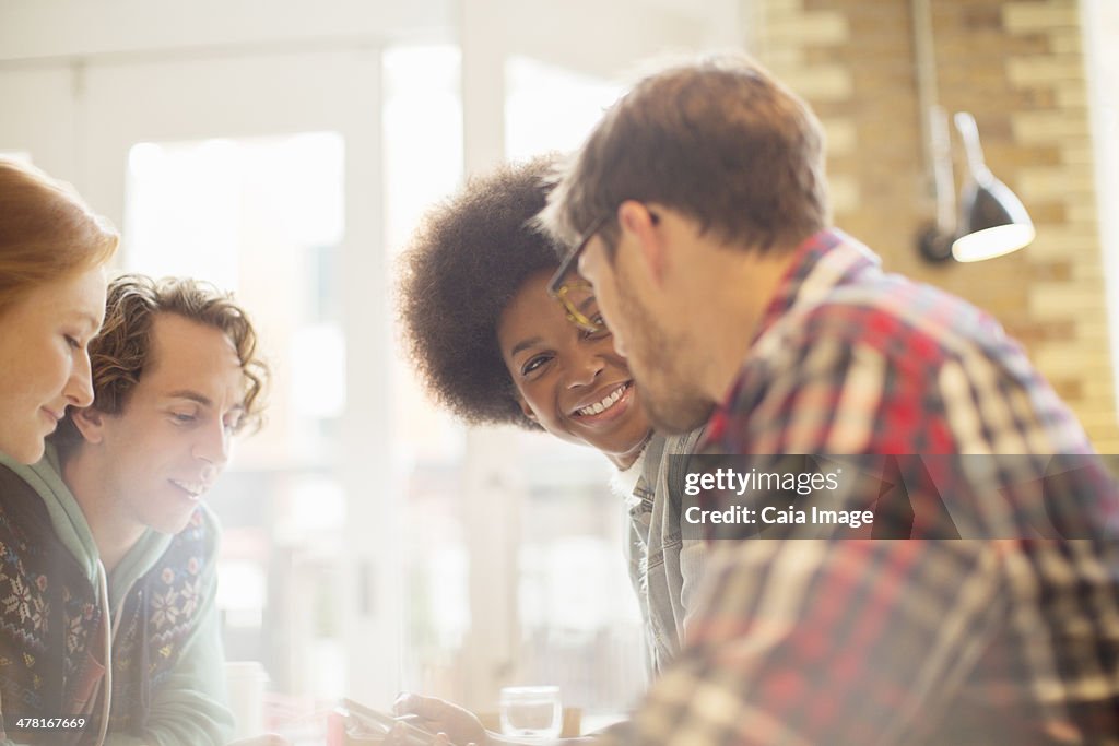 Friends talking in cafe