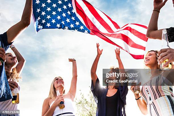 friends celebrating us independence day - fourth of july party stock pictures, royalty-free photos & images