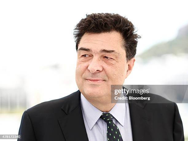 Alexis Papahelas, chief editor of Kathimerini newspaper, poses for a photograph following a Bloomberg Television interview in Athens, Greece, on...