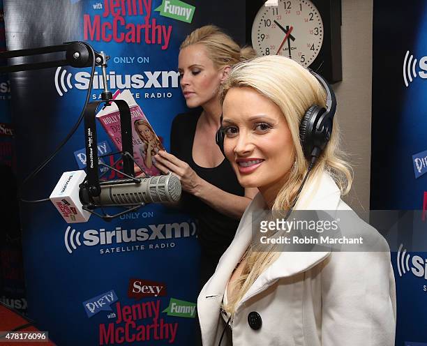 Holly Madison poses for a photo with host Jenny McCarthy during a visit to 'Dirty, Sexy, Funny with Jenny McCarthy' at SiriusXM Studios on June 23,...