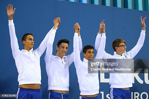 Silver medalists Alessandro Bori, Ivano Vendrame, Giovanni Izzo and Alessandro Miressi of Italy pose on the medal podium following the Men's Swimming...