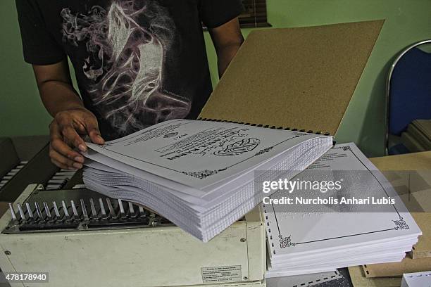 Quran printed in Braille at blind foundation on June 23, 2015 in Tangerang, Indonesia. Braille Quran is the translation of Quran verses to Braille...