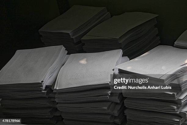 Quran printed in Braille at blind foundation on June 23, 2015 in Tangerang, Indonesia. Braille Quran is the translation of Quran verses to Braille...