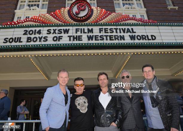 Gary Kemp, John Keeble, Steve Norman, Martin Kemp and Tony Hadley of Spandau Ballet pose for pictures during the screening of "The Soul Boys of The...