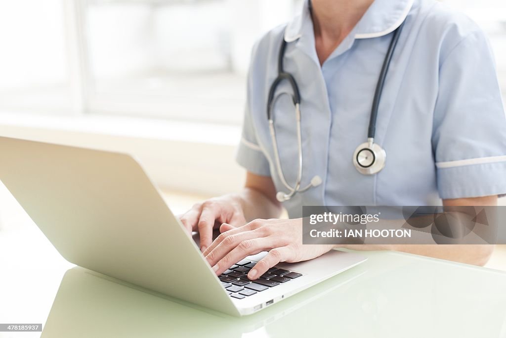 Nurse using a laptop computer