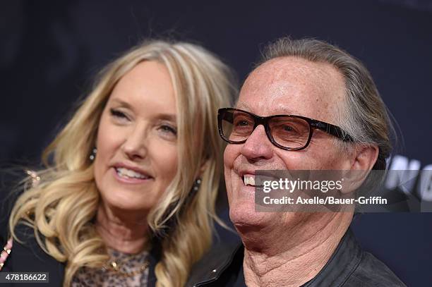 Actor Peter Fonda and Parky Fonda arrive at the World Premiere of 'Jurassic World' at Dolby Theatre on June 9, 2015 in Hollywood, California.