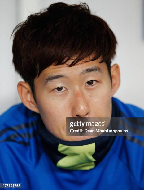 Son Heung-Min of Bayer Leverkusen looks on prior to the UEFA Champions League Round of 16 second leg match between Paris Saint-Germain FC and Bayer...