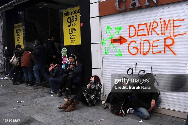 Riot police uses water cannons against protesters during clashes at the funeral of Berkin Elvan on March 12, 2014 in Istanbul. Riot police fired tear...