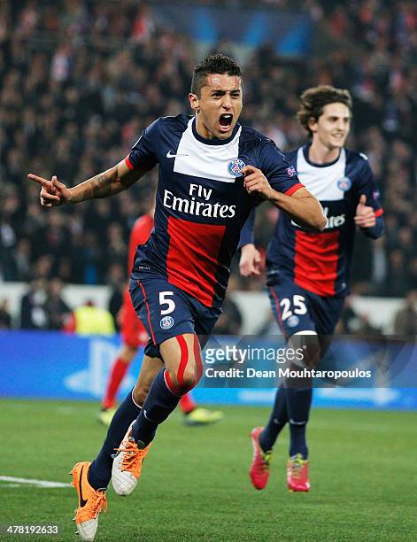 Marquinhos of Paris Saint-Germain celebrates as he scores their first goal during the UEFA Champions League Round of 16 second leg match between...