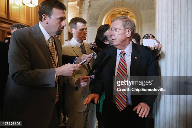 Sen. Johnny Isakson talks to reporters following the weekly Republican Senate policy luncheon at the U.S. Capitol June 23, 2015 in Washington, DC....