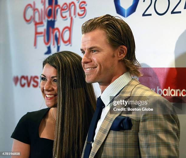 Brock Holt, right, of the Boston Red Sox is pictured with his wife Lakyn, left, at the third annual "David Ortiz Children's Fund Gala" held at the...