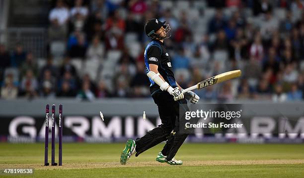 New Zealand batsman Mitchell Santner reacts after being bowled by Mark Wood during the NatWest International Twenty20 match between England and New...