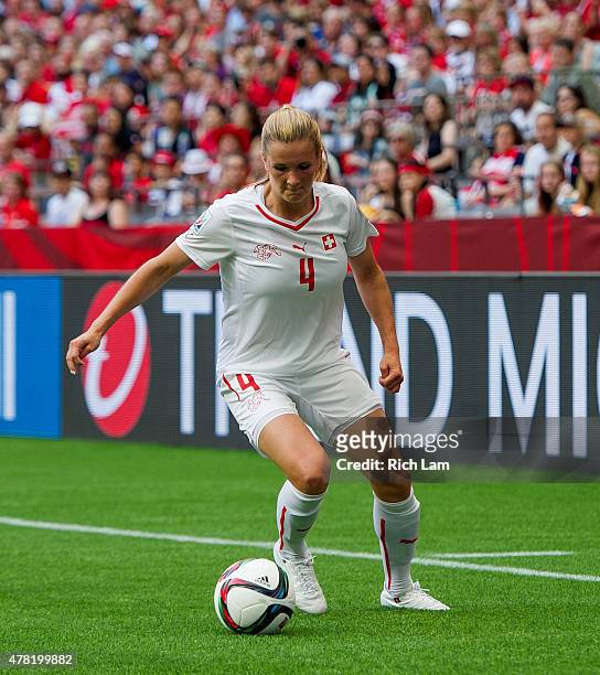 Rachel Rinast of Switzerland runs with the the ball during the FIFA Women's World Cup Canada 2015 Round of 16 match between Switzerland and Canada...