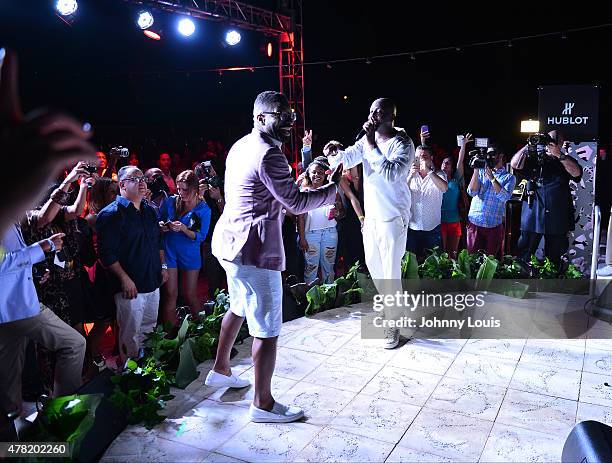 Wyclef Jean and DJ Irie on stage at the VIP Kick-Off Concert during the 11th Annual Irie Weekend at Kimpton Surfcomber Hotel on June 18, 2015 in...