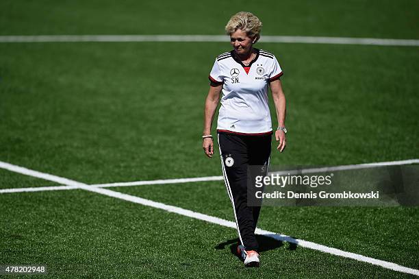 Head coach Silvia Neid of Germany looks on during a training session at Complexe Sportif Multi Sports on June 23, 2015 in Montreal, Canada.