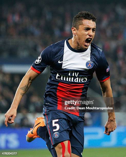 Marquinhos of Paris Saint-Germain celebrates as he scores their first goal during the UEFA Champions League Round of 16 second leg match between...