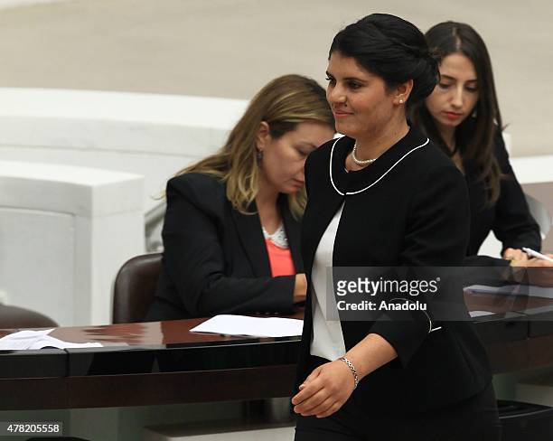 People's Democratic Party's MP of Sanliurfa Dilek Ocalan walks to take oath at the Grand National Assembly of Turkey during the Turkish parliament's...
