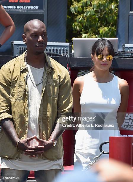 Actors Tyrese Gibson and Michelle Rodriguez attend the premiere press event for the new Universal Studios Hollywood Ride "Fast &...