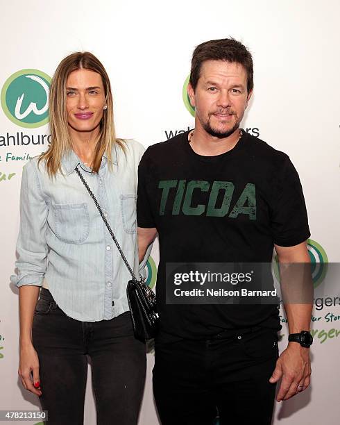 Actor Mark Wahlberg and Rhea Durham attend the Wahlburgers Coney Island Preview Party on June 23, 2015 in the Brooklyn Borough of New York City.