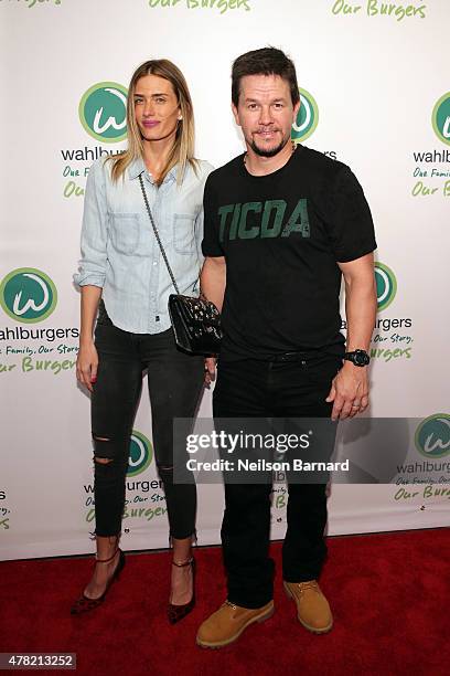 Actor Mark Wahlberg and Rhea Durham attend the Wahlburgers Coney Island Preview Party on June 23, 2015 in the Brooklyn Borough of New York City.