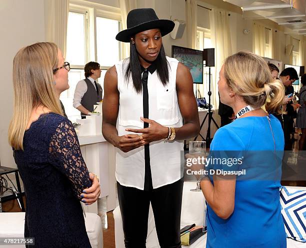 Rio Olympic hopeful Tina Charles speaks with guests at the TeamUSA New View event at Midtown Loft & Terrace on June 23, 2015 in New York City.