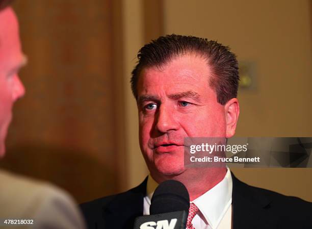 General manager Jim Benning of the Vancouver Canucks speaks with the media following the NHL general managers meetings at the Bellagio Las Vegas on...