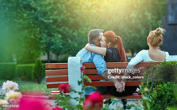 cheating - love triangle stock pictures, royalty-free photos & images