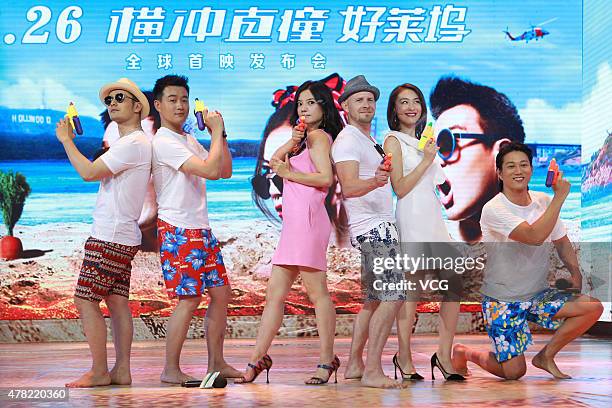 Actor Huang Xiaoming, actor Tong Dawei, actress Vicki Zhao, director Timothy Kendall, actress Sarah Li and actor Sung Kang attend a sunny beach...