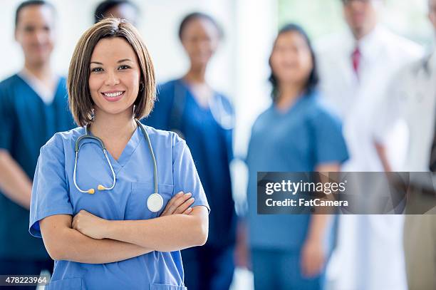 group of medical professionals - smiling nurse stock pictures, royalty-free photos & images