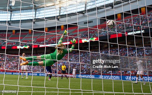 Goalkeeper Loes Geurts of the Netherlands fails to stop the shot of Mizuho Sakaguchi of Japan resulting in a goal during the FIFA Women's World Cup...