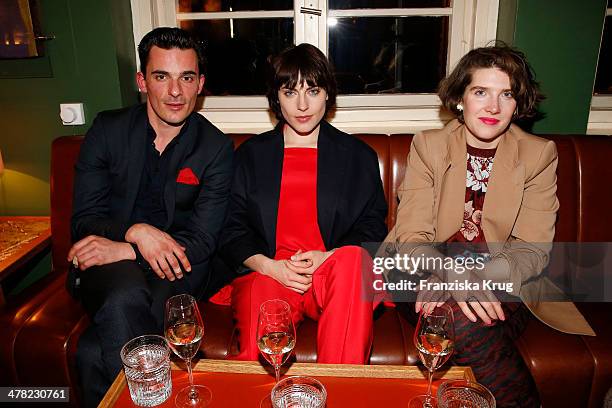 Harald Wegener, Antje Traue and Leena Zimmermann attend the Drykorn X Bungalow Dinner at Pauly Saal on March 12, 2014 in Berlin, Germany.