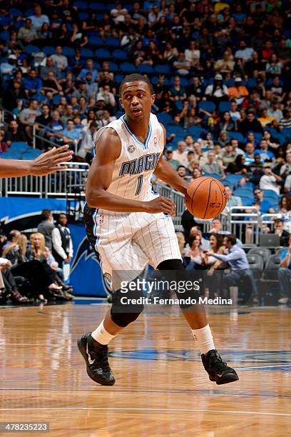 Doron Lamb of the Orlando Magic handles the ball against the Denver Nuggets on March 12, 2014 at Amway Center in Orlando, Florida. NOTE TO USER: User...