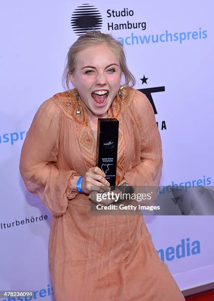 Elisa Schlott poses with her award during the Studio Hamburg Nachwuchspreis 2015 at Thalia Theater on June 23, 2015 in Hamburg, Germany.