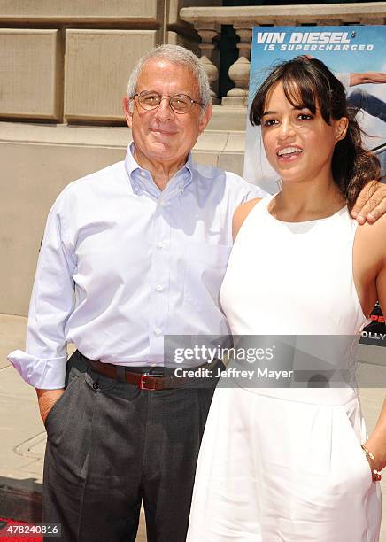 NBCUniversal Vice Chairman Ron Meyer and actress Michelle Rodriguez attend the 'Fast & Furious - Supercharged' ride premiere at Universal Studios...