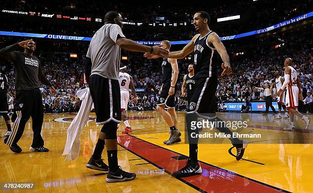 Shaun Livingston of the Brooklyn Nets reacts to winning a game against the Miami Heat at American Airlines Arena on March 12, 2014 in Miami, Florida....