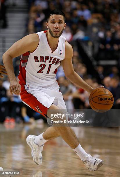 Raptor guard Greivis Vasquez moves the ball around the top of the half court. Toronto Raptors vs Detroit Pistons during 2nd half action of NBA play...