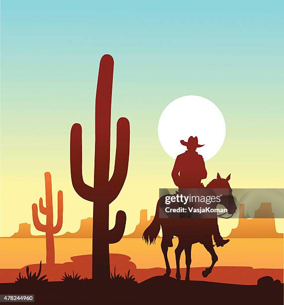 lone cowboy riding in the desert - wild west stock illustrations