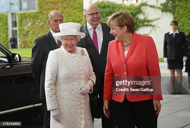 German Chancellor Angela Merkel welcomes Queen Elizabeth II and Prince Philip , the Duke of Edinburgh, at the Chancellery as Minister of the...