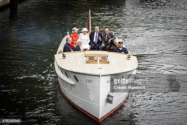 In this photo provided by the German Government Press Office , Daniela Schadt, Queen Elizabeth II, German President Joachim Gauck and Prince Philip,...