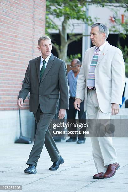 Boston Police Commisioner William Evans, left, arrives at John Joseph Moakley United States Courthouse for the official sentencing of Boston Marathon...