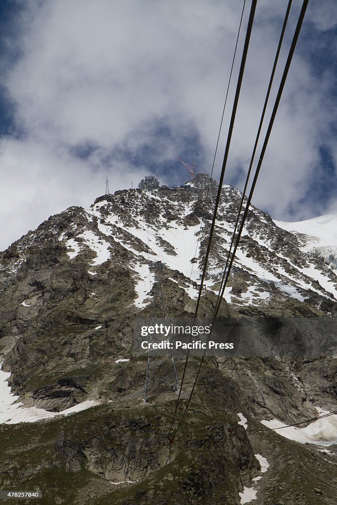 View from the cable car towards Pointe Helbronner station of...