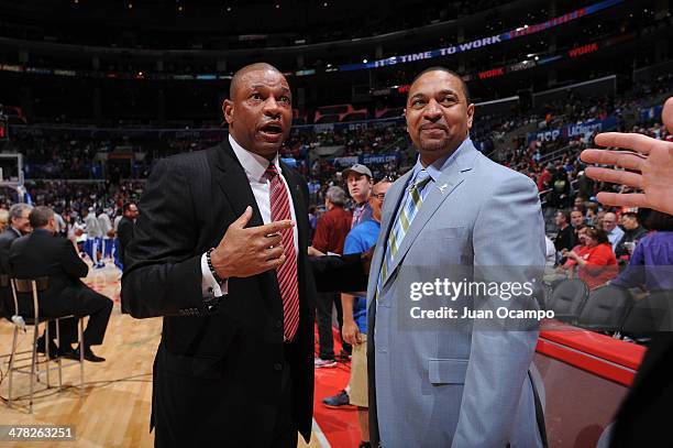 Head coach Doc Rivers of the Los Angeles Clippers and Mark Jackson of the Golden State Warriors greet each other at Staples Center on March 12, 2014...